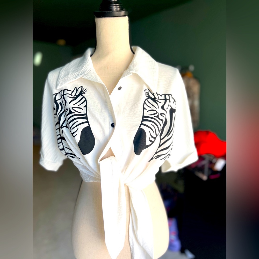 White crop top with Zebra print. Size large 10-12.